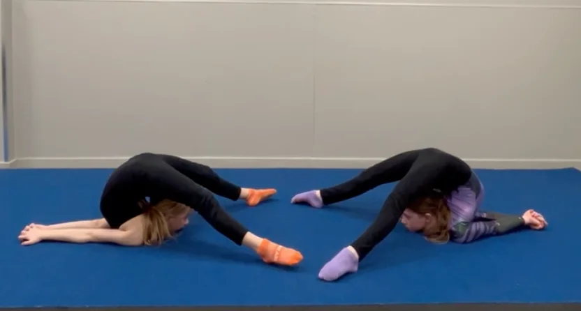A Capital Circus contortion student in Ottawa performing a deep backbend, showcasing the flexibility and strength taught in our contortion classes.