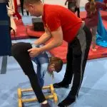 Handbalancing push up, stradle push up