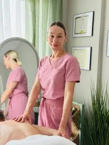 Massage therapist Lidiia Hrynchenko, providing youth athlete injury prevention and gymnastics recovery massage in Ottawa